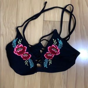 Black bikini top with floral design